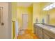 Bathroom with double sinks, and a shower with tile walls at 361 Whitfield Ave, Sarasota, FL 34243