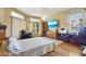 Bright bedroom featuring a ceiling fan, TV, natural light, and an inviting layout at 361 Whitfield Ave, Sarasota, FL 34243