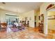 Bright dining room with tile flooring and a view to the backyard through large windows at 361 Whitfield Ave, Sarasota, FL 34243