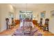 Elegant dining room with colorful rug and ample space for entertaining guests at 361 Whitfield Ave, Sarasota, FL 34243