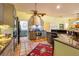 Spacious kitchen with stainless steel appliances, granite countertops, and a patterned backsplash at 361 Whitfield Ave, Sarasota, FL 34243