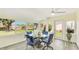Cozy breakfast nook with views of the landscaped backyard at 4172 Oakhurst W Cir, Sarasota, FL 34233