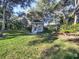 Community gazebo surrounded by a beautiful landscaped yard at 4172 Oakhurst W Cir, Sarasota, FL 34233
