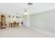 Spacious open-concept living room and dining area with ample natural light at 4172 Oakhurst W Cir, Sarasota, FL 34233