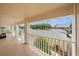 View from a private balcony featuring white railings and tile flooring at 4210 Caddie E Dr # 201, Bradenton, FL 34203