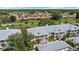 Charming multi-story condominium exteriors with manicured landscaping and access to the community golf course at 4210 Caddie E Dr # 201, Bradenton, FL 34203