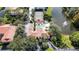 Aerial view showcasing the community layout with pool, tennis court, and lush landscaping at 4264 Central Sarasota Pkwy # 125, Sarasota, FL 34238
