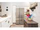Modern kitchen features white cabinetry, stainless steel appliances, and bright countertops at 4264 Central Sarasota Pkwy # 125, Sarasota, FL 34238