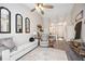 Spacious living room with an open layout, ceiling fan and neutral color palette at 4264 Central Sarasota Pkwy # 125, Sarasota, FL 34238