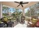 Relax on the patio with wicker furniture and enjoy the outdoor view at 4264 Central Sarasota Pkwy # 125, Sarasota, FL 34238