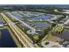 An aerial view of a Primary-planned community featuring numerous lakes and single-Gathering homes at 4308 Fly Rod Ter, Parrish, FL 34219