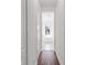 Hallway view of a bright bathroom with free standing tub and tile floors at 4308 Fly Rod Ter, Parrish, FL 34219