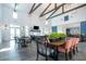 Spacious community room featuring tables, chairs, a fireplace, and high ceilings with exposed wooden beams at 4308 Fly Rod Ter, Parrish, FL 34219