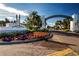 The entrance to the community has lovely landscaping and a well-maintained sign for Canoe Creek at 4308 Fly Rod Ter, Parrish, FL 34219