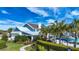 Community center boasts lush landscaping, well-maintained walkways, and inviting poolside seating for residents at 4308 Fly Rod Ter, Parrish, FL 34219