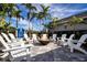 Outdoor fire pit area surrounded by comfortable Adirondack chairs, perfect for relaxing and socializing at 4308 Fly Rod Ter, Parrish, FL 34219