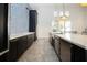 Stylish community kitchen with stainless steel appliances, custom cabinets, and ample counter space at 4308 Fly Rod Ter, Parrish, FL 34219