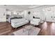 Spacious living room features modern decor, stylish furniture, hardwood floors, and an open layout at 4308 Fly Rod Ter, Parrish, FL 34219