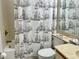 Nautical themed full bathroom with shower and tub combination at 4325 46Th W Ave # 202, Bradenton, FL 34210
