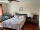 Bright bedroom with a comfortable bed, soft lighting, and a pleasant seating area at 4325 46Th W Ave # 202, Bradenton, FL 34210