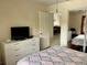 This bedroom has a closet, with the living area viewable through the open door at 4325 46Th W Ave # 202, Bradenton, FL 34210
