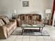 Inviting living room featuring comfortable seating, neutral tones, and ample space for relaxation and entertainment at 4325 46Th W Ave # 202, Bradenton, FL 34210