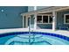 Features a community spa with a cascading fountain and poolside lounge area at 4325 46Th W Ave # 202, Bradenton, FL 34210