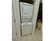 Stackable washer and dryer tucked away in a closet at 4325 46Th W Ave # 202, Bradenton, FL 34210