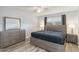 Bedroom with ceiling fan, window and side tables with lamps at 4440 Ironwood Cir # 508D, Bradenton, FL 34209