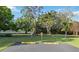 Tennis parking lot with greenery in the background at 4440 Ironwood Cir # 508D, Bradenton, FL 34209