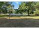 Community tennis courts surrounded by mature trees provide a beautiful recreational space at 4440 Ironwood Cir # 508D, Bradenton, FL 34209