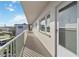 Exterior walkway with door entrance showcasing natural light and outdoor access at 4440 Ironwood Cir # 508D, Bradenton, FL 34209