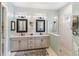 This bathroom has a double vanity with a shower at 4625 Foxtail Dr, Parrish, FL 34219