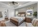 Inviting bedroom with decorative ceiling, neutral color scheme, and ample space at 4625 Foxtail Dr, Parrish, FL 34219