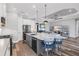Open concept kitchen with a large center island, stainless steel appliances, and breakfast bar seating at 4625 Foxtail Dr, Parrish, FL 34219