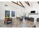 Spacious lounge with high ceilings, wooden beams and elegant decor at 4625 Foxtail Dr, Parrish, FL 34219