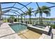 Beautiful pool with a spa, a shallow tanning area, and a lake view at 4625 Foxtail Dr, Parrish, FL 34219