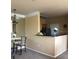 Inviting view of the kitchen and dining area, promoting an open concept at 4802 51St W St # 2010, Bradenton, FL 34210