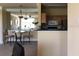 Partial view of the dining area and kitchen, showing an open-concept space at 4802 51St W St # 2010, Bradenton, FL 34210