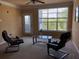 Bright living room featuring natural light, stylish seating, and comfortable layout at 4802 51St W St # 2010, Bradenton, FL 34210