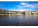 Community featuring a pond with a fountain surrounded by multiple condo buildings at 4802 51St W St # 2010, Bradenton, FL 34210