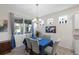 Cozy dining area with natural light, complete with table, chairs, and charming decor at 5727 Oak Bridge Ct, Bradenton, FL 34211
