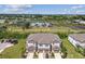 Aerial view of well-maintained townhome with a view of gardens and expansive surrounding landscape at 633 Royal Empress Dr, Ruskin, FL 33570