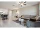 Bright and airy living room with a comfortable sofa, stylish decor, and open floor plan at 633 Royal Empress Dr, Ruskin, FL 33570