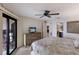 Bedroom featuring a waterfront balcony, creating a serene and relaxing retreat at 6500 Flotilla Dr # 125, Holmes Beach, FL 34217