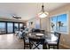 Comfortable living space with dining area and water views from the window that floods the room with natural light at 6500 Flotilla Dr # 125, Holmes Beach, FL 34217