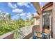 Balcony with golf course view, perfect for relaxing and enjoying the scenery at 7334 Regina Royale # 74, Sarasota, FL 34238
