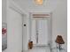 Bright hallway entrance on the third floor to unit 3R at 7334 Regina Royale # 74, Sarasota, FL 34238