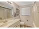 Well-lit bathroom featuring vanity, toilet, and shower/tub combo at 755 Taplow Rd, Venice, FL 34293