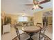 Inviting dining area open to the living room, perfect for entertaining guests at 755 Taplow Rd, Venice, FL 34293